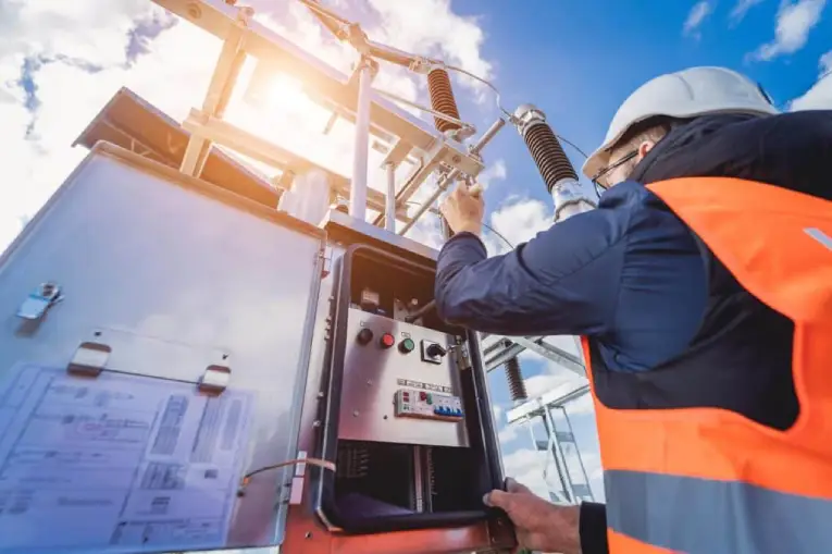 Certified industrial electrician performing electrical troubleshooting at a Vancouver facility